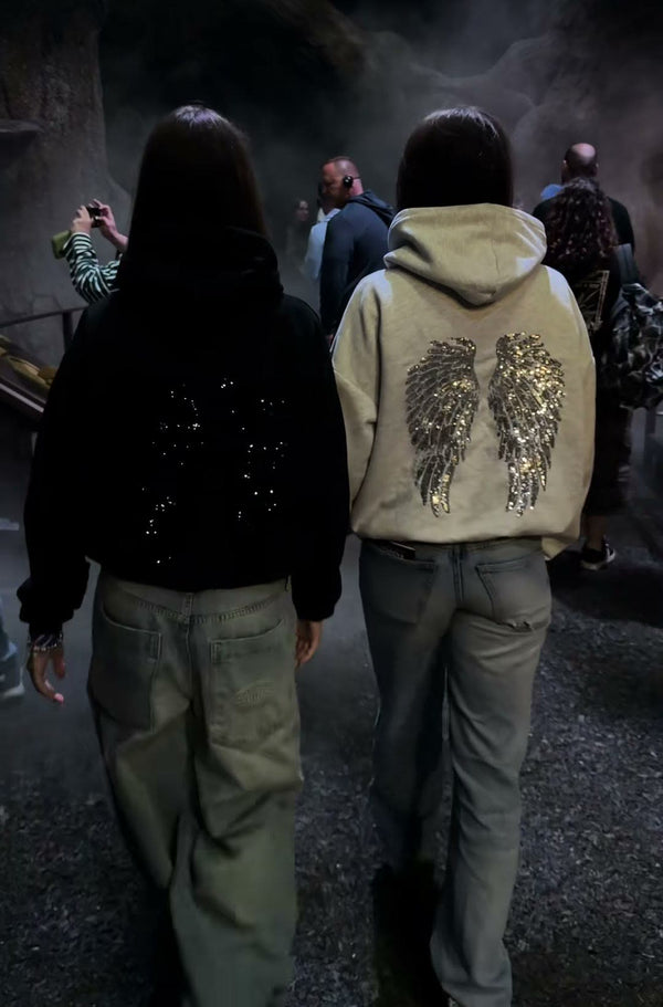 Heist Studio customer wearing the Angel Sequin Hoodie